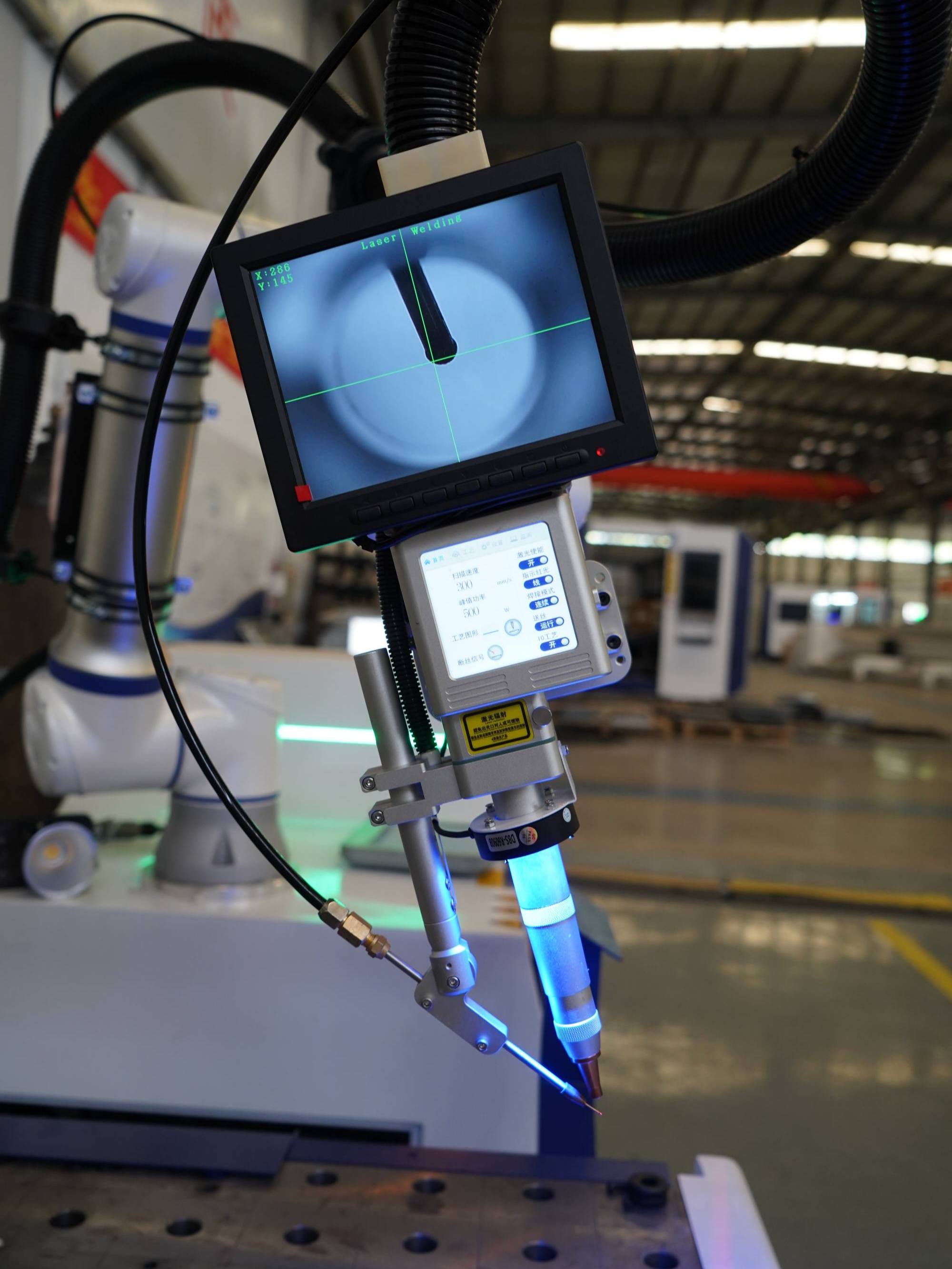 Machine de soudage laser robotis&eacute;e